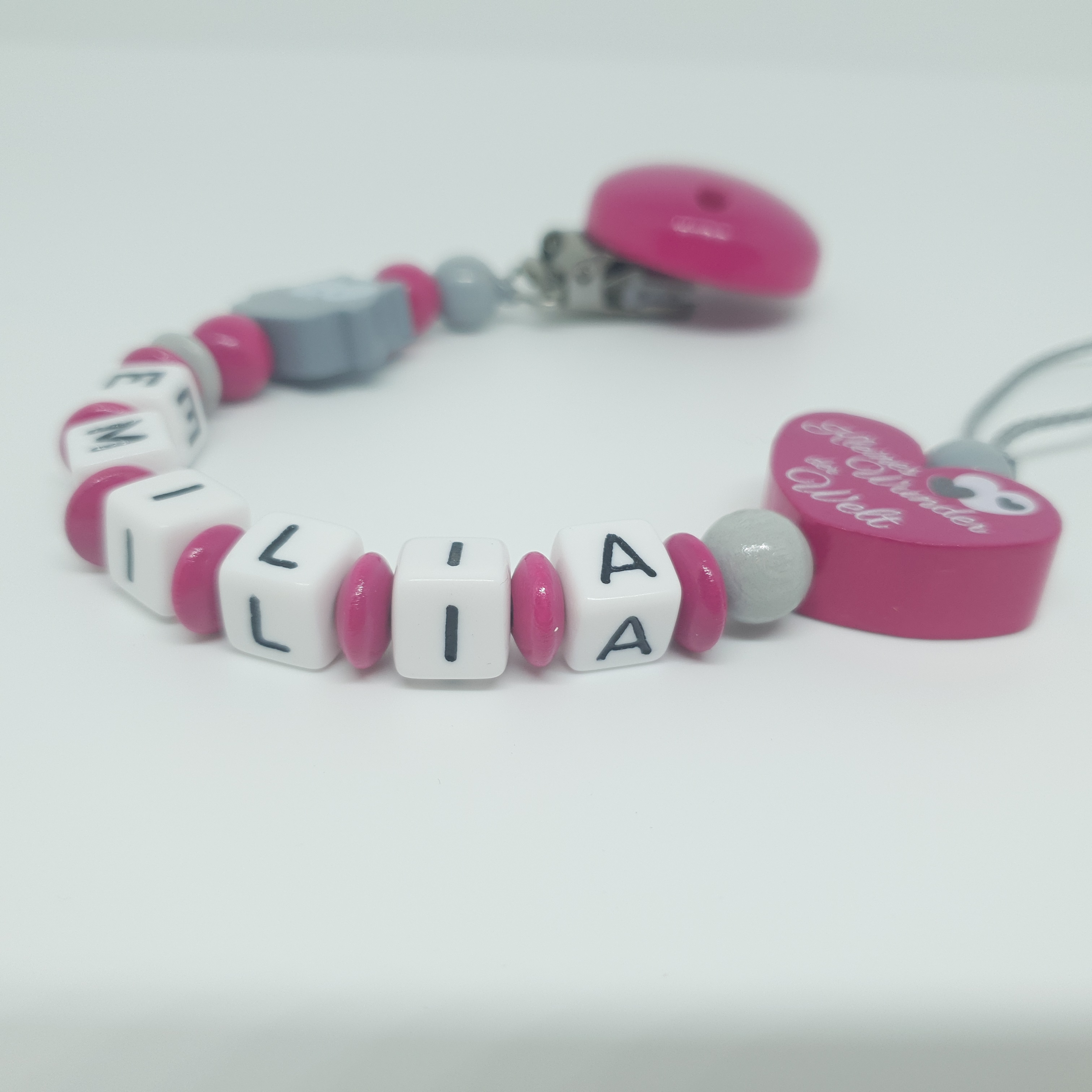 Schnullerkette mit Namen "Eule" und "Kleines Wunder der Welt" in Pink und Grau von Kimberly Baby