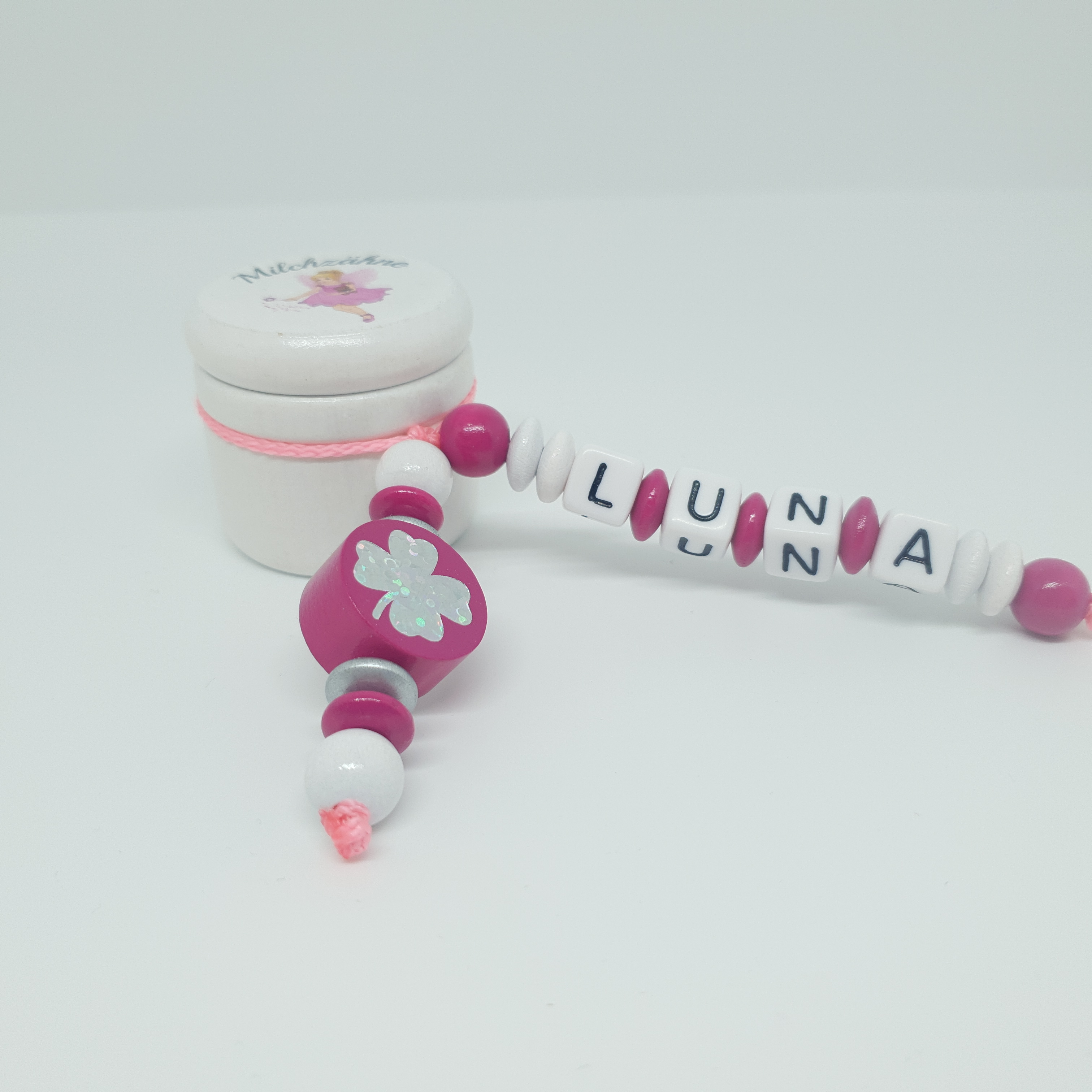 milchzahndose_fee-kleeblatt_weiss-pink