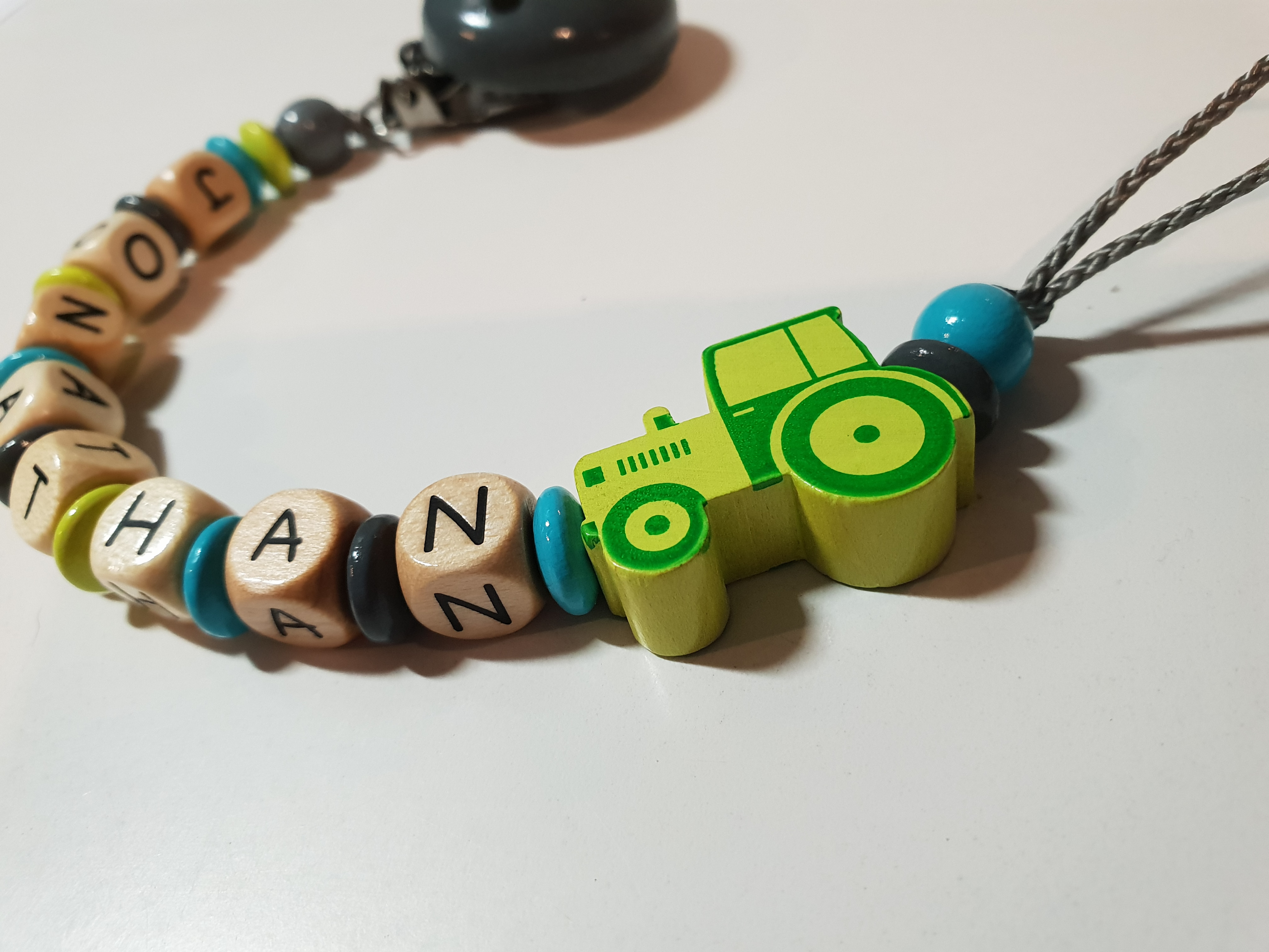 Baby Schnullerkette mit Namen - Traktor in grau grün helltürkis